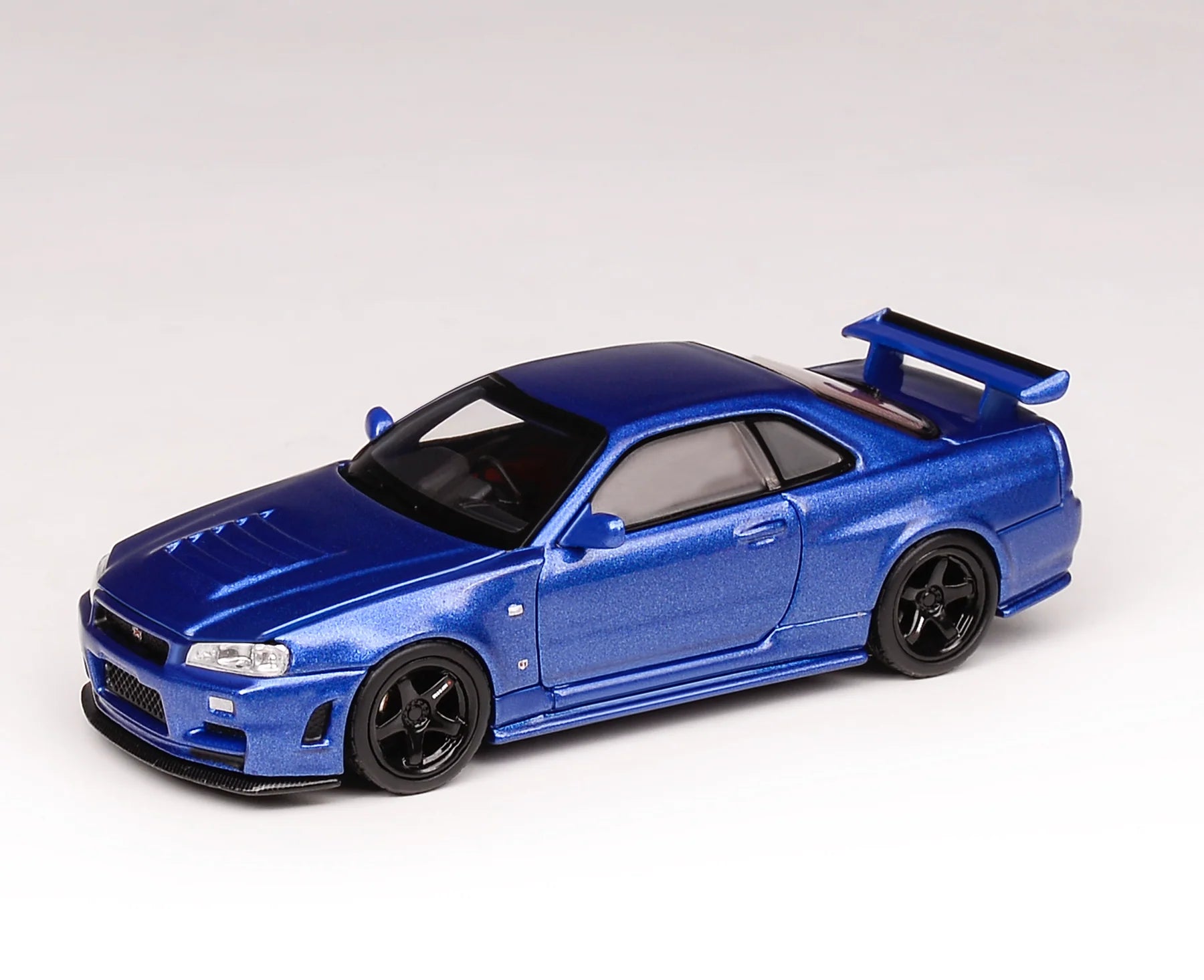 MOTORHELIX 1:64 Nissan NISMO R34GT-R Z-tune Bayside Blue M63416
