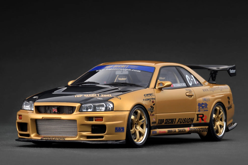 IG3847 TOP SECRET 34GT-R (BNR34) Gold 1/18