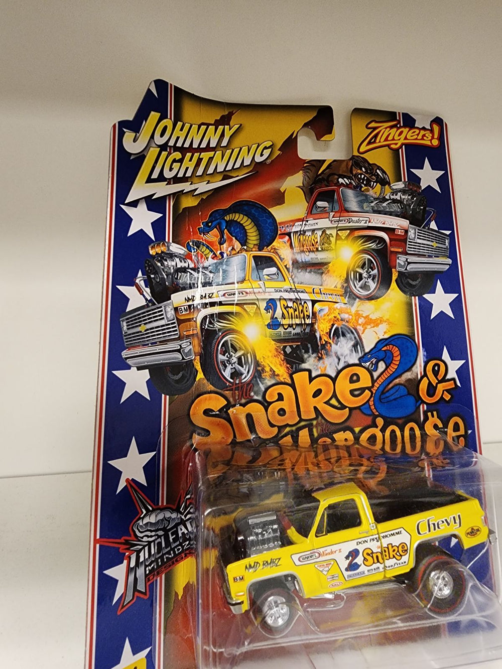 2023 Weekend of Wheels Johnny Lightning 1981 Zinger Silverado Snake and Mongoose Damaged Packaging